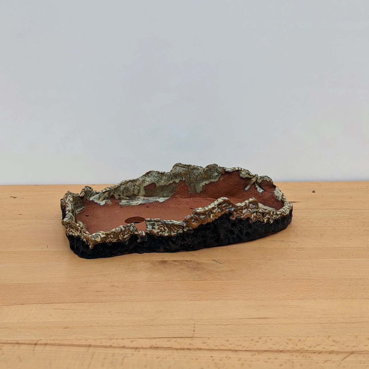 12" Handmade Planter By Moe Lewis-Wolf (No. 39) 1 12" Handmade Planter By Moe Lewis-Wolf (No. 39)